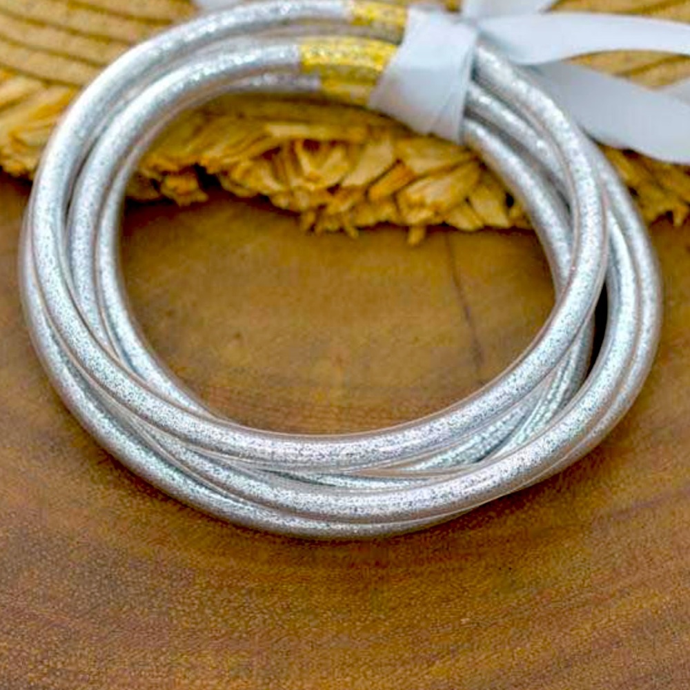 Silver and gold bracelets